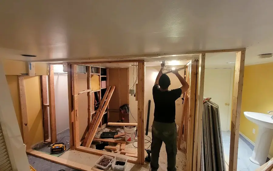 A Toronto basement with new framing where the bathroom would go