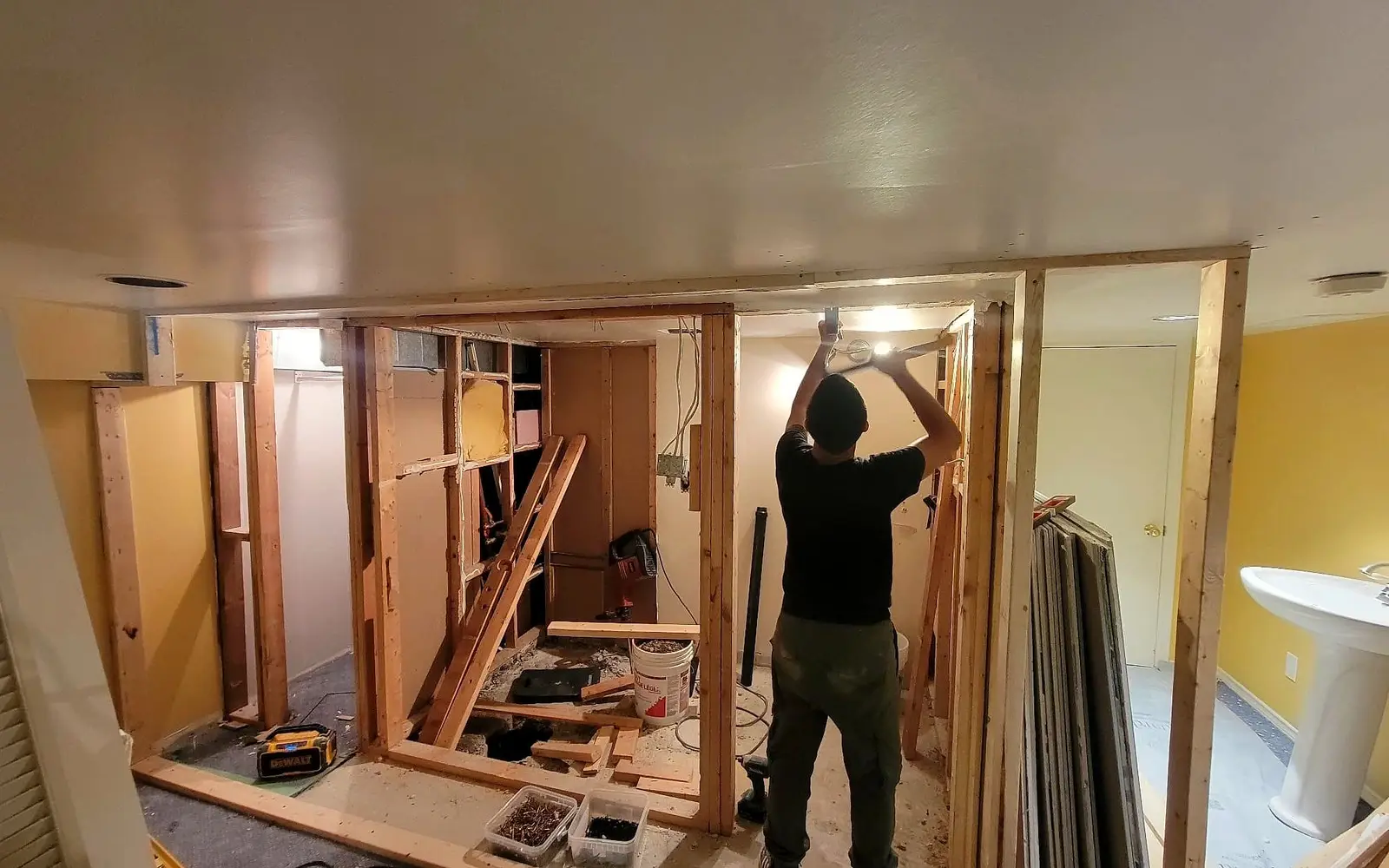 A Toronto basement with new framing where the bathroom would go